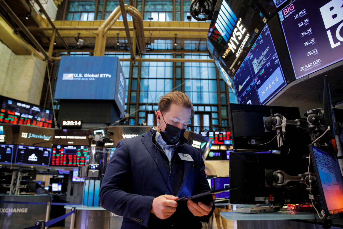 Stocks shed gains, Treasury yields jump as Fed signals rate hikes could come &#8216;soon&#8217;