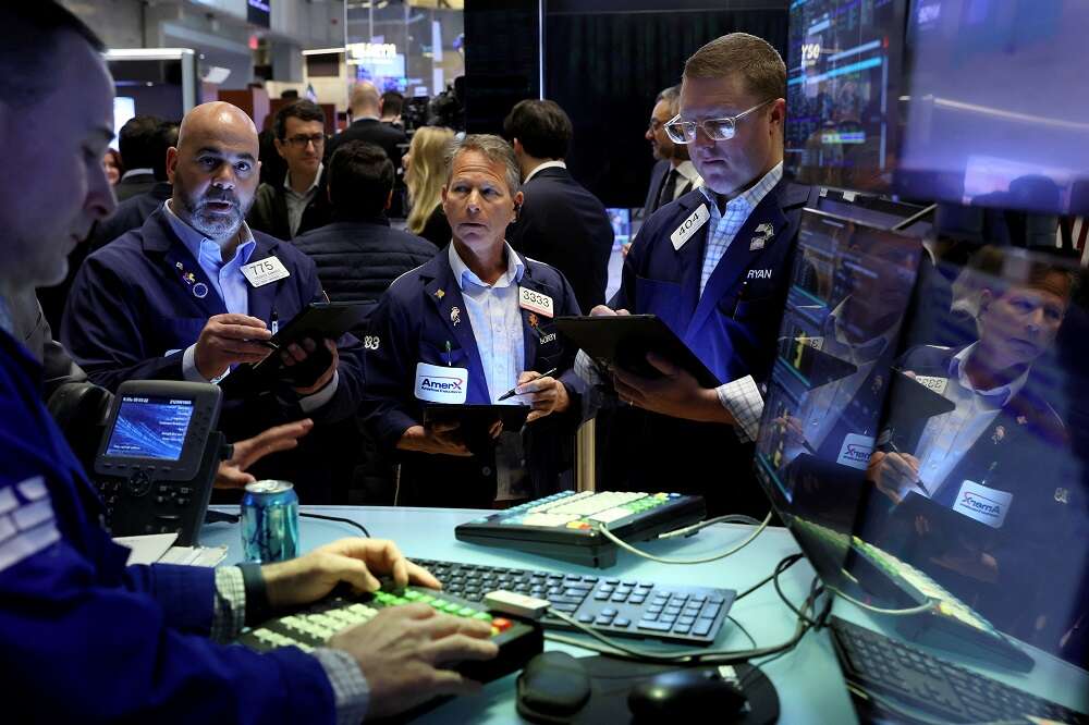 Stocks rise, U.S. yields slip as markets await Fed rate hike