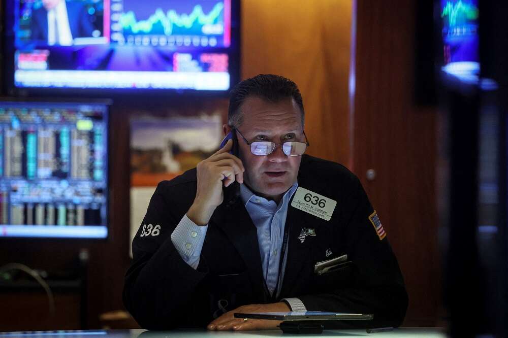 Stocks fall as strong U.S. payrolls muddies rate bets