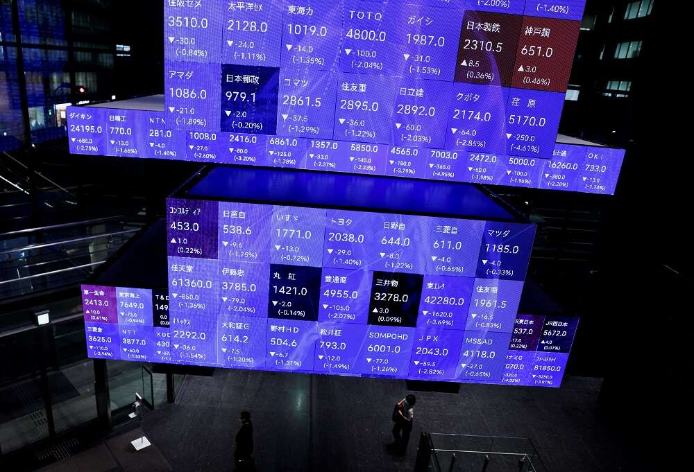 Stocks, dollar little changed as inflation data sends mixed signals