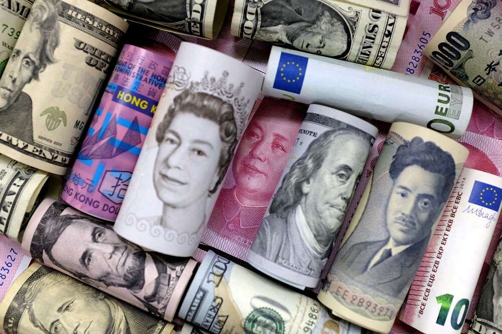 Dollar slips, yuan gains on China PMI; hot inflation lifts euro