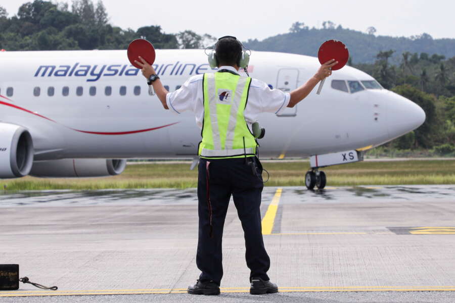 Asia&#8217;s airlines ramp up flights, offers as tough COVID travel curbs ease