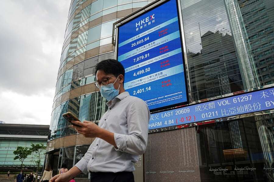 Wall St ends lower, Treasury yields slide as data fuels recession jitters
