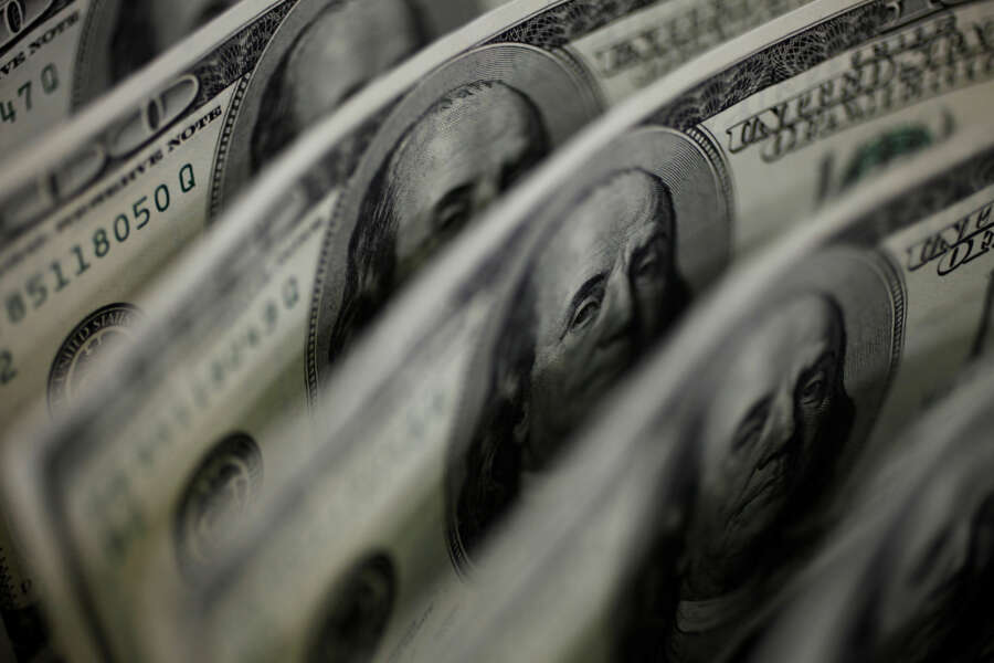 Pound hits one-year high against struggling dollar