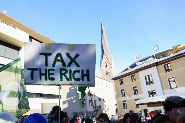 As Davos crowd gathers, governments urged to rein in &#8216;billionaire class&#8217;