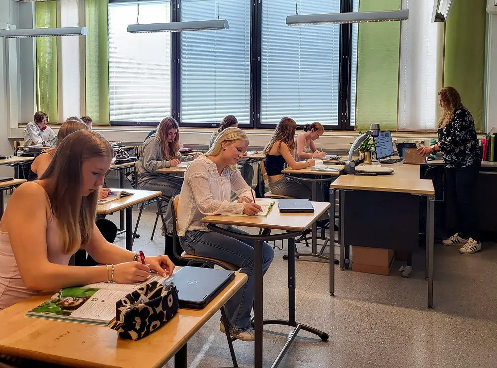 Books in, screens out: some Finnish pupils go back to paper after tech push