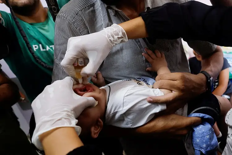 Global health fund says health, climate, conflict &#8216;triple whammy&#8217; hits world&#8217;s poorest