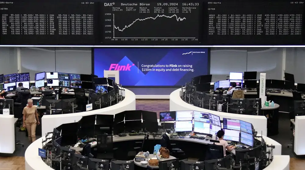 European shares slip but set for weekly gains; Mercedes drops