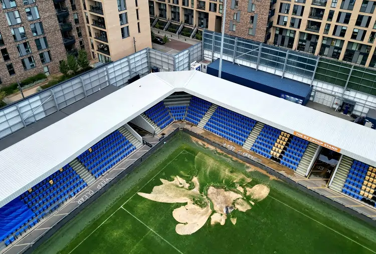 Soccer-&#8216;I thought it was AI,&#8217; says Wimbledon director of flooding images at stadium