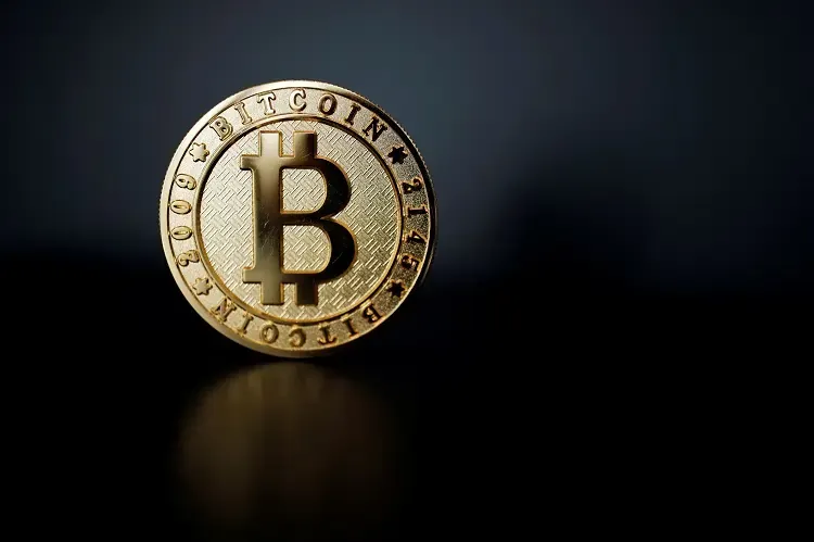 Tepid start to week for world stocks, but gold, bitcoin shine