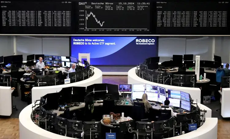 FTSE 100 closes higher on earnings boost