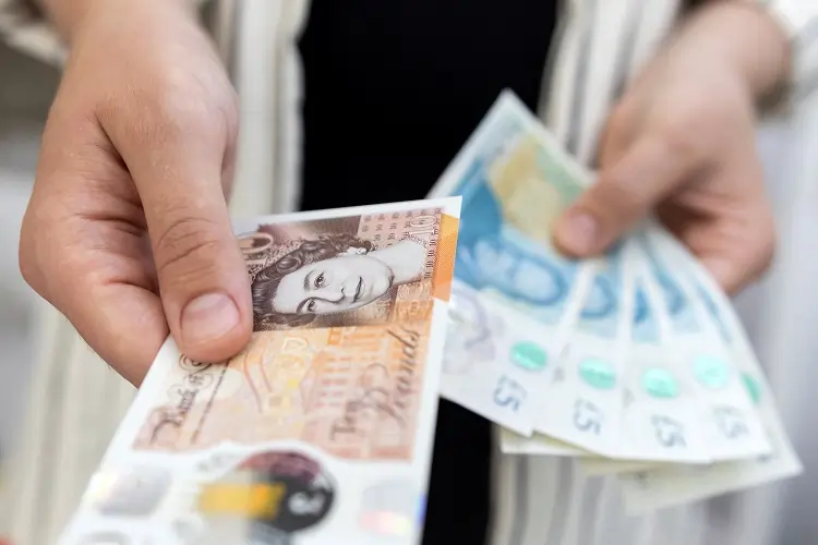 Steady sterling on track for best G10 performance against dollar in 2024
