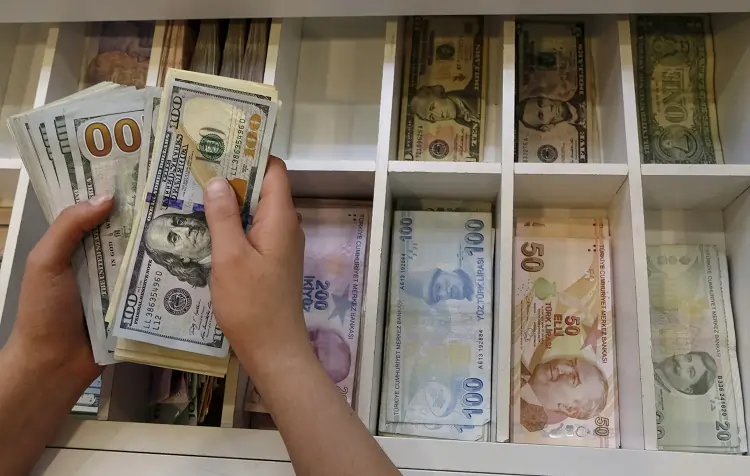 Dollar edges up as market looks to CPI data; Aussie, kiwi rise on China