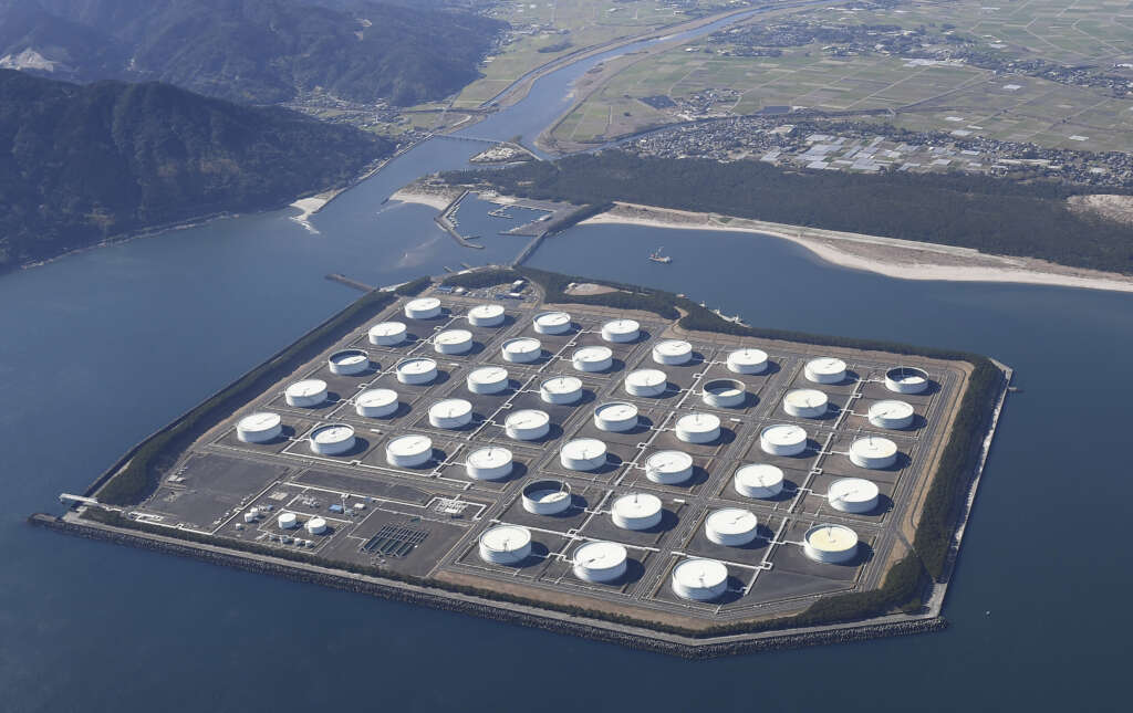 Oil up as market weighs supply cuts against gloomy economic outlook