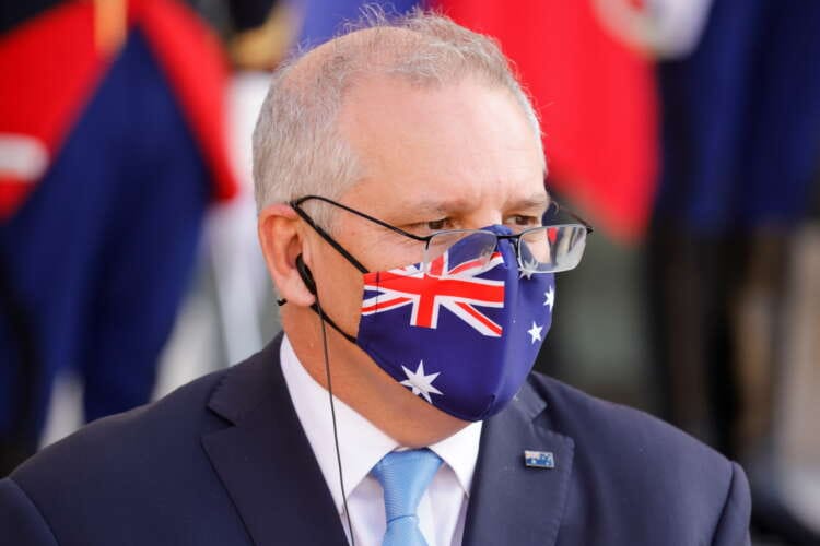Australia says it has evacuated 26 people from Afghanistan in first flight