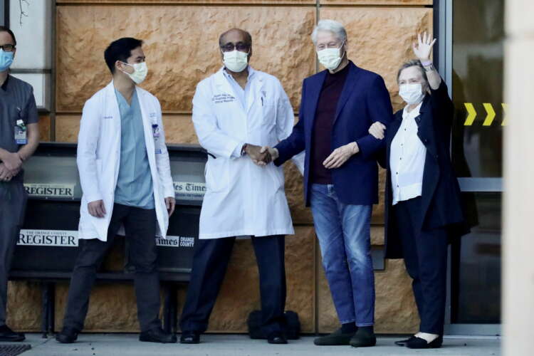 Former U.S. President Clinton leaves hospital, heads to New York