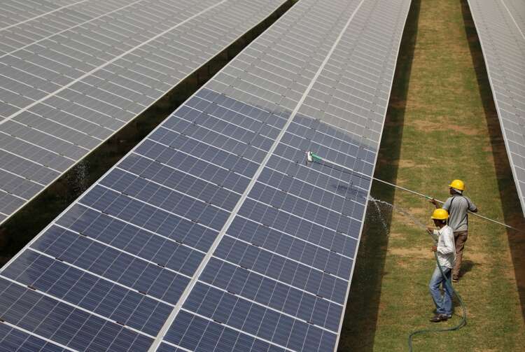Britain launches plan to boost green investments in emerging markets