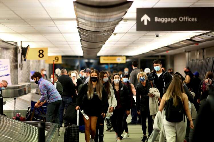 Eager travellers line up for U.S. flights as COVID travel curbs are lifted