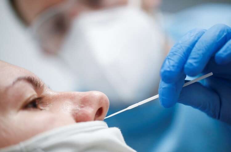 Germany, U.S. agree to new COVID curbs as Omicron spreads across globe