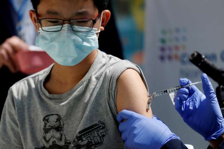 U.S. FDA backs Pfizer&#8217;s COVID-19 booster shot for 12- to 15-year-olds