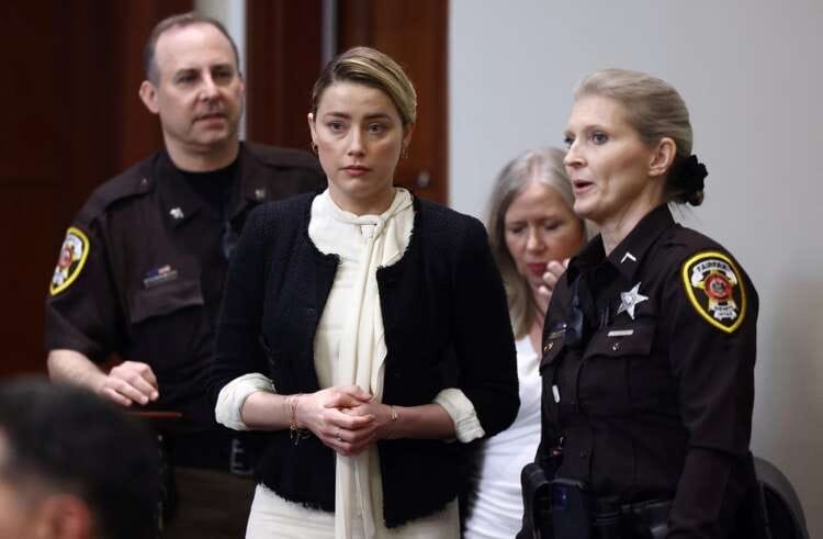 Amber Heard says Johnny Depp became violent when jealous