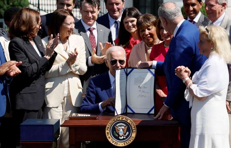Biden signs bill to boost U.S. chips, compete with China