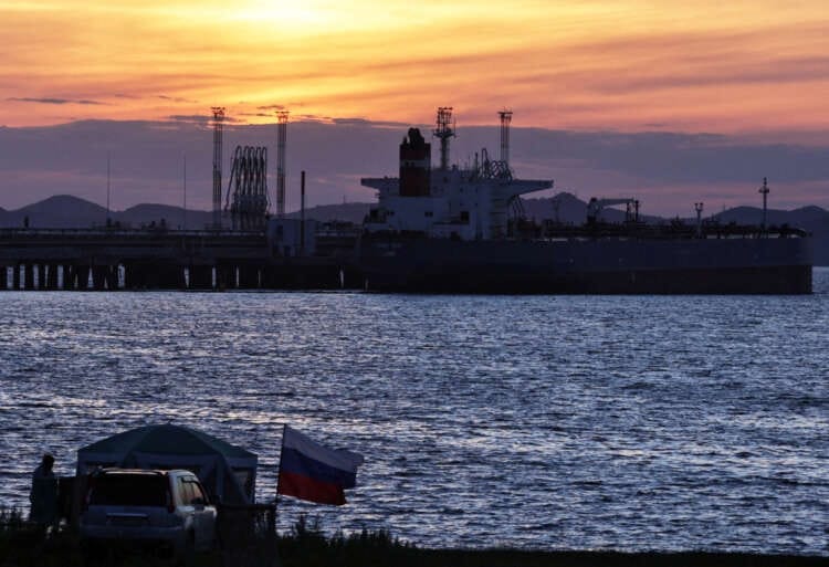 Oil set to end turbulent 2022 modestly higher