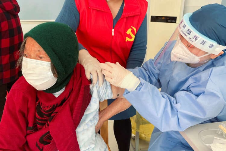 Chinese fret over elderly as WHO warns of holiday COVID surge