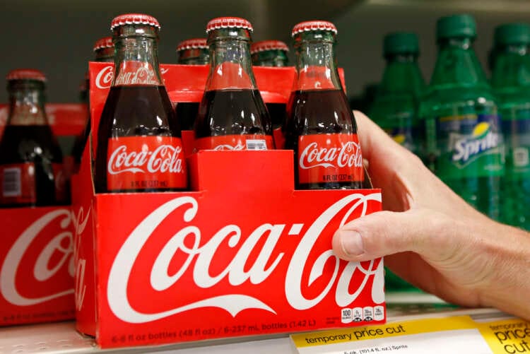 Coca-Cola HBC&#8217;s annual profit beats, warns of price increases