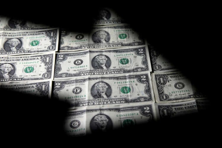 Dollar skids after soft U.S. economic data; impact of OPEC+ cuts fades