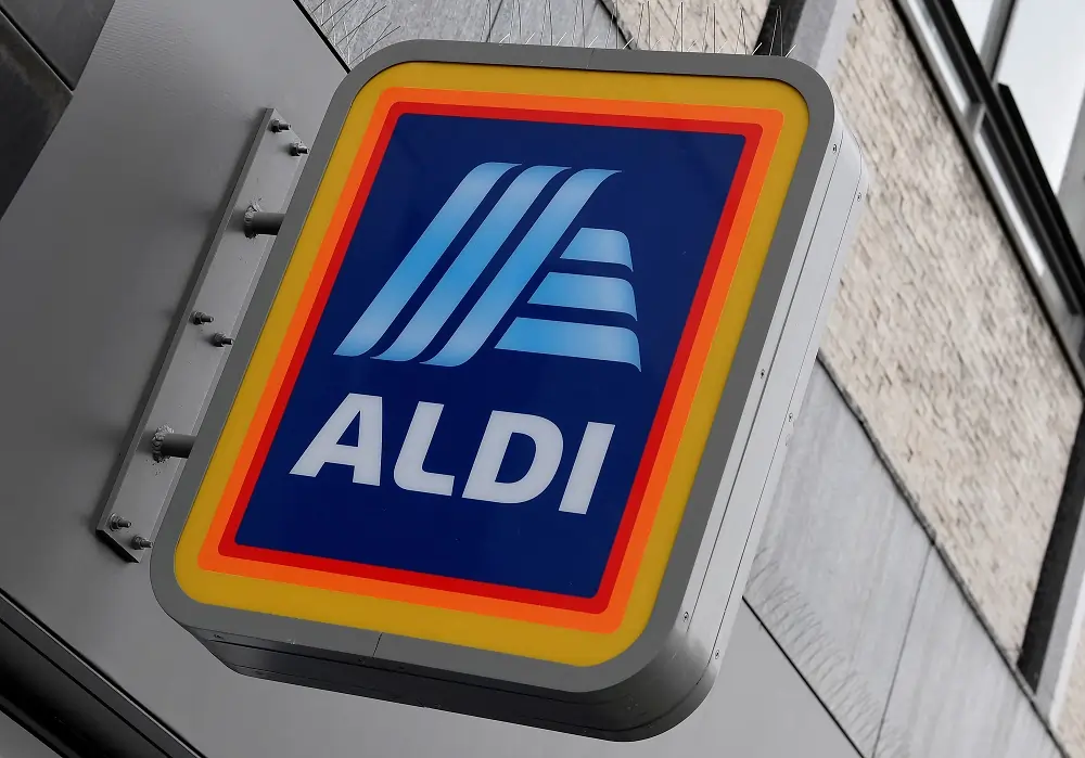 Aldi UK says shoppers trading up as inflation eases