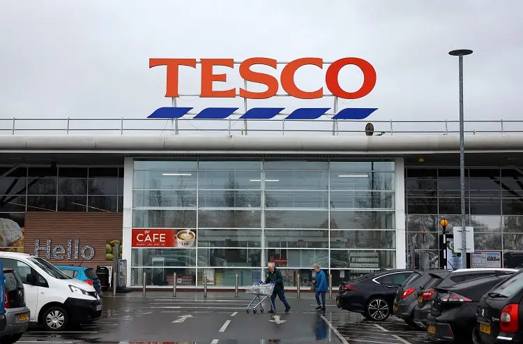 Britain&#8217;s Tesco lifts annual profit forecast after strong first half