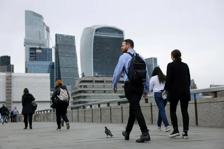 Britain outlines details of closely watched workers&#8217; rights plan