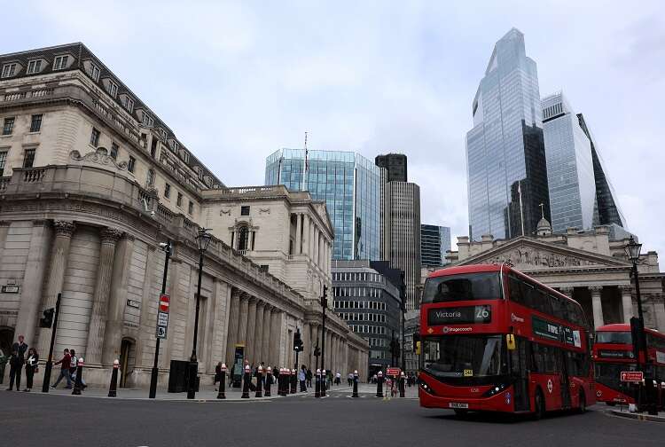 UK firms lost momentum and cut staff after budget, surveys show