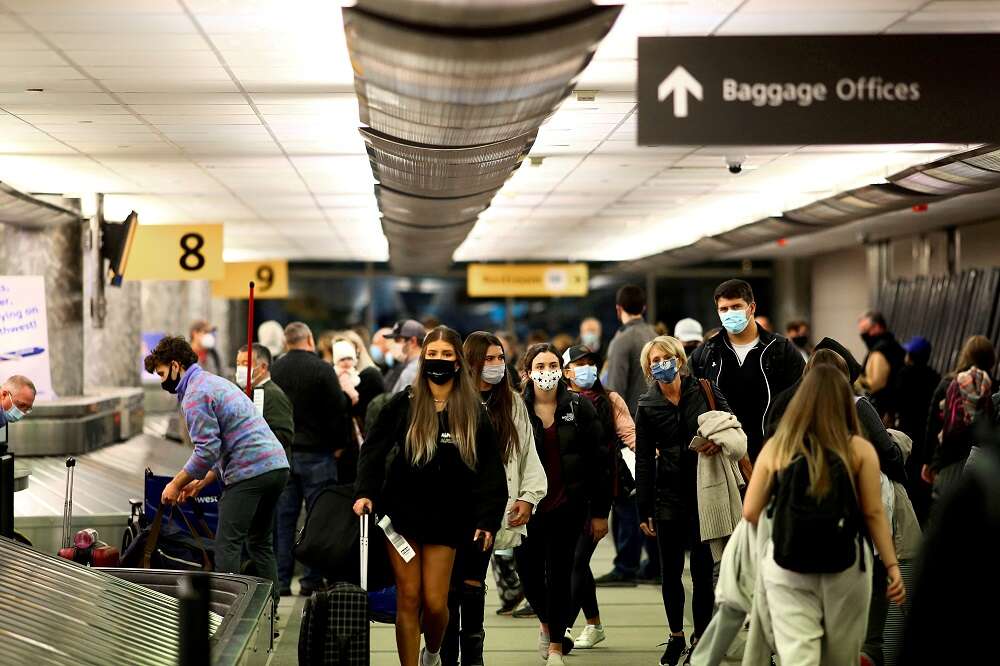 Eager travellers line up for U.S. flights as COVID travel curbs are lifted