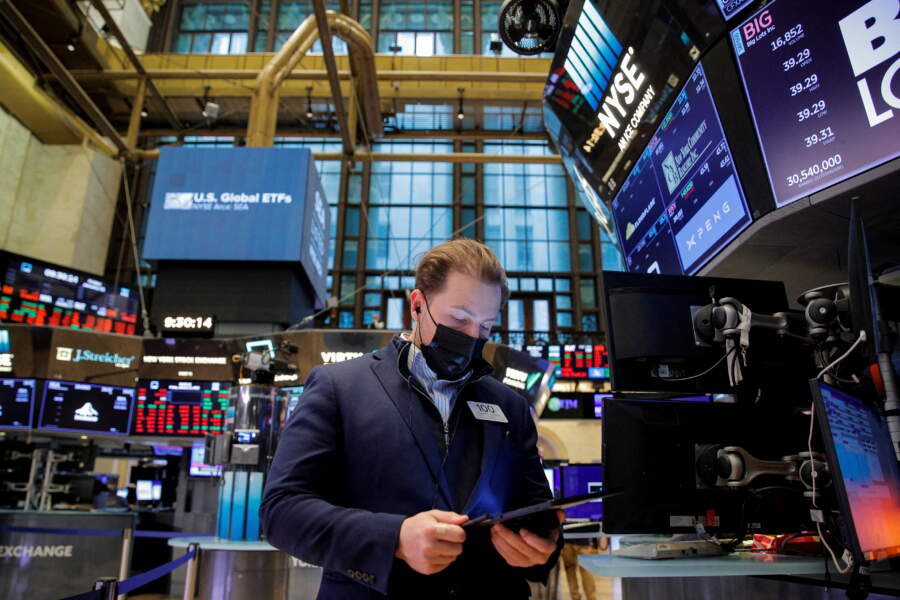 Stocks shed gains, Treasury yields jump as Fed signals rate hikes could come &#8216;soon&#8217;