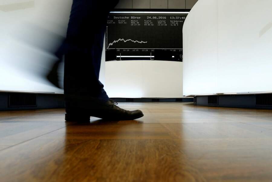 Global stocks to grind higher, lacklustre year ahead: Reuters poll