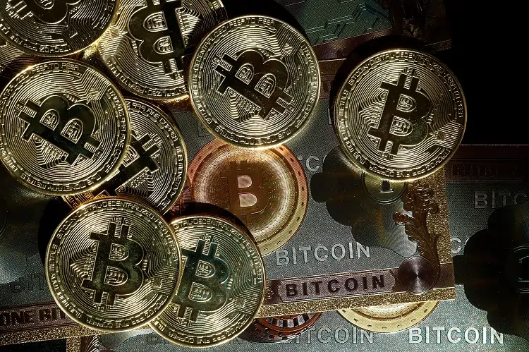 Bitcoin jumps while Japan holiday dulls most currencies